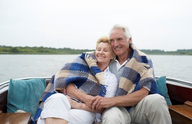 42712_Active Adult Couple Sitting on Boat